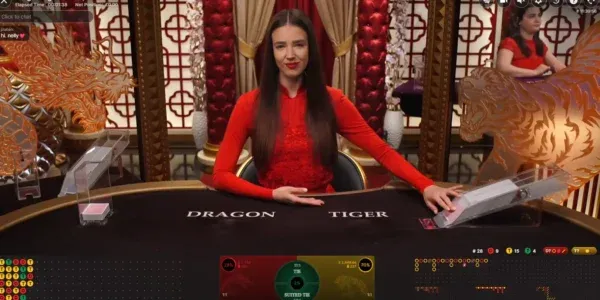 Live Dragon Tiger two-card high card showdown broadcast from luxury studio